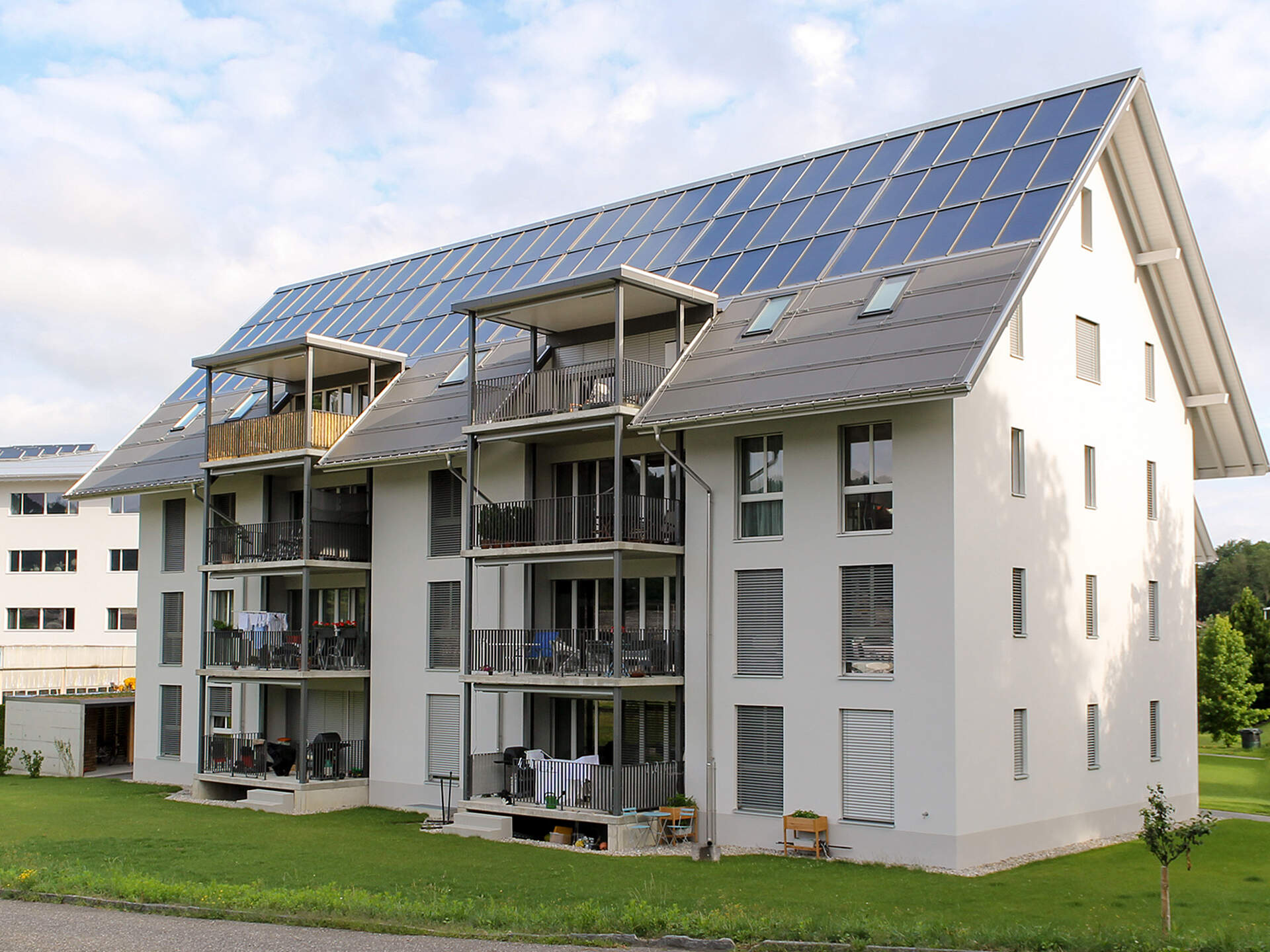 Apartment building with solar system on roof